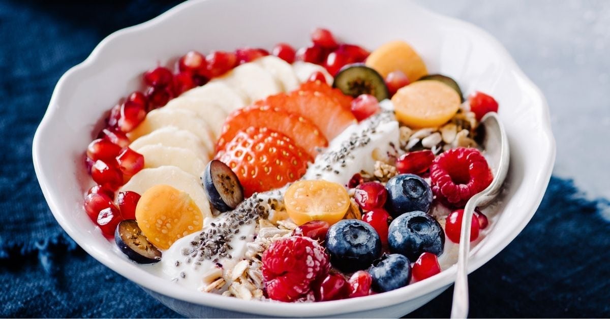 Homemade Oatmeal with Berries and Pomegranate in a Bowl