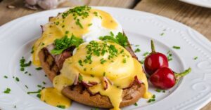 Tasty Eggs Benedict with Herbs