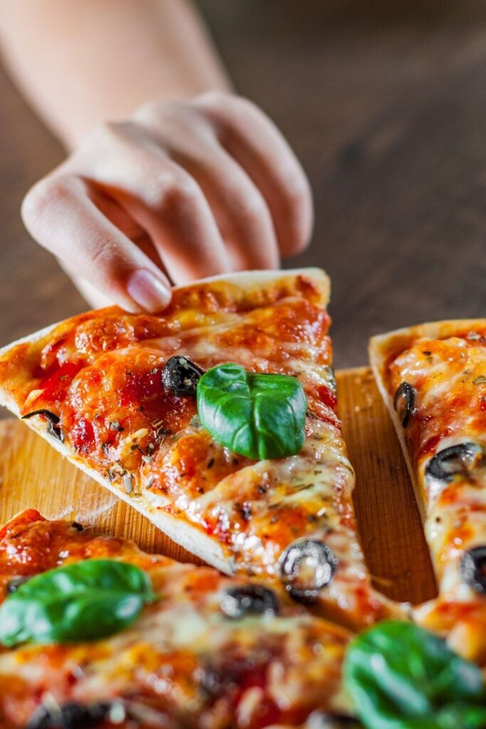 Easy Vegetarian Recipes For Kids including Vegetarian Pizza with Mozzarella, Basil and Olives