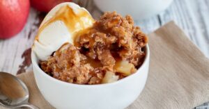 Bowl of Sweet Apple Crisp with Ice Cream