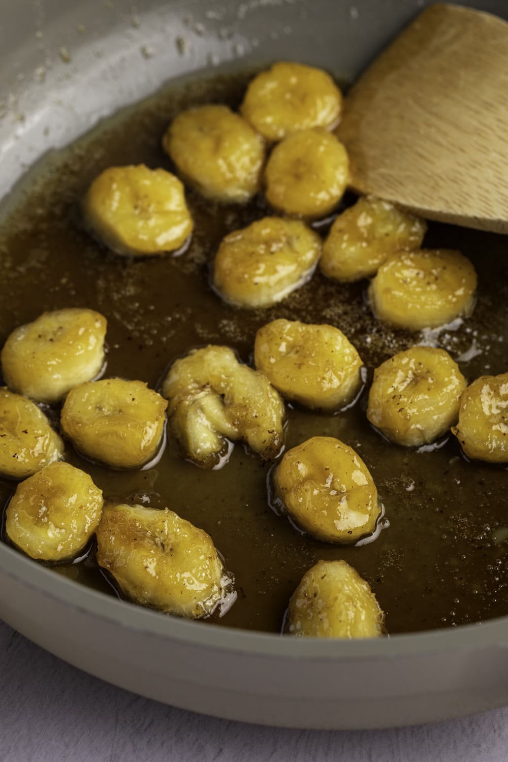 Caramelized Bananas Glazing With Sugar Syrup in a Pan