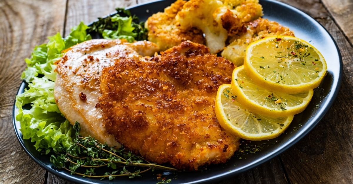 Homemade Pork Schnitzel with Cauliflower and Lemons