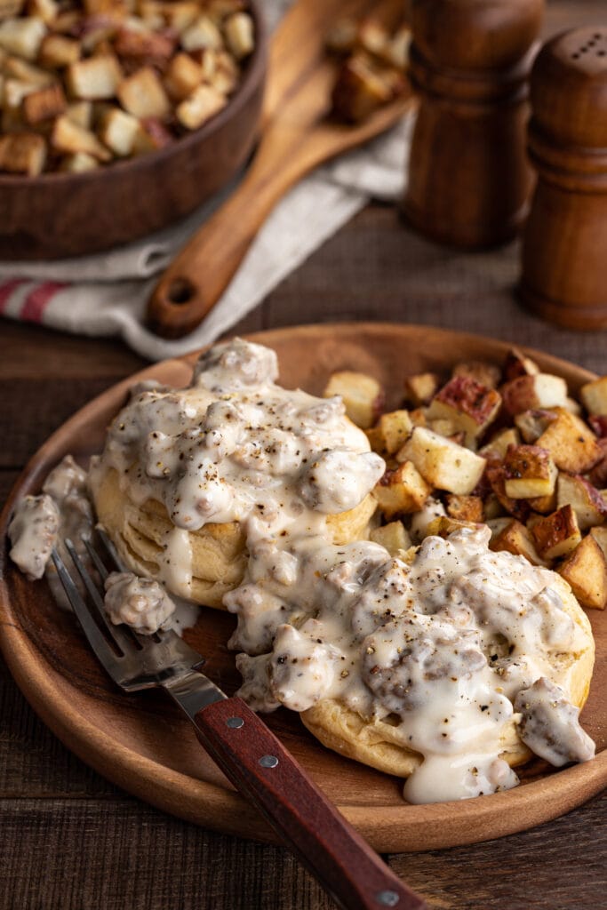 Sausage Gravy on Wooden Plate