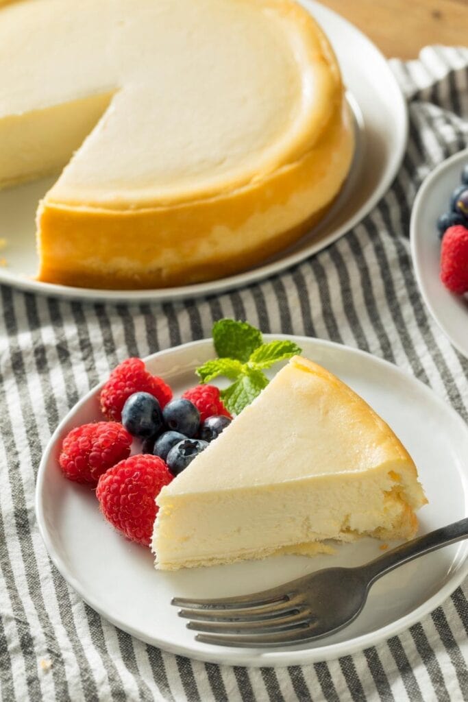 Slice of Sara Lee Cheesecake served with Fresh Berries