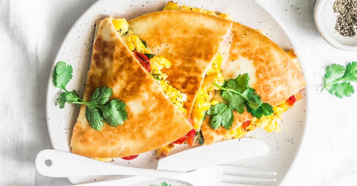 Scrambled Eggs and Ham Quesadillas with Vegetables for Breakfast