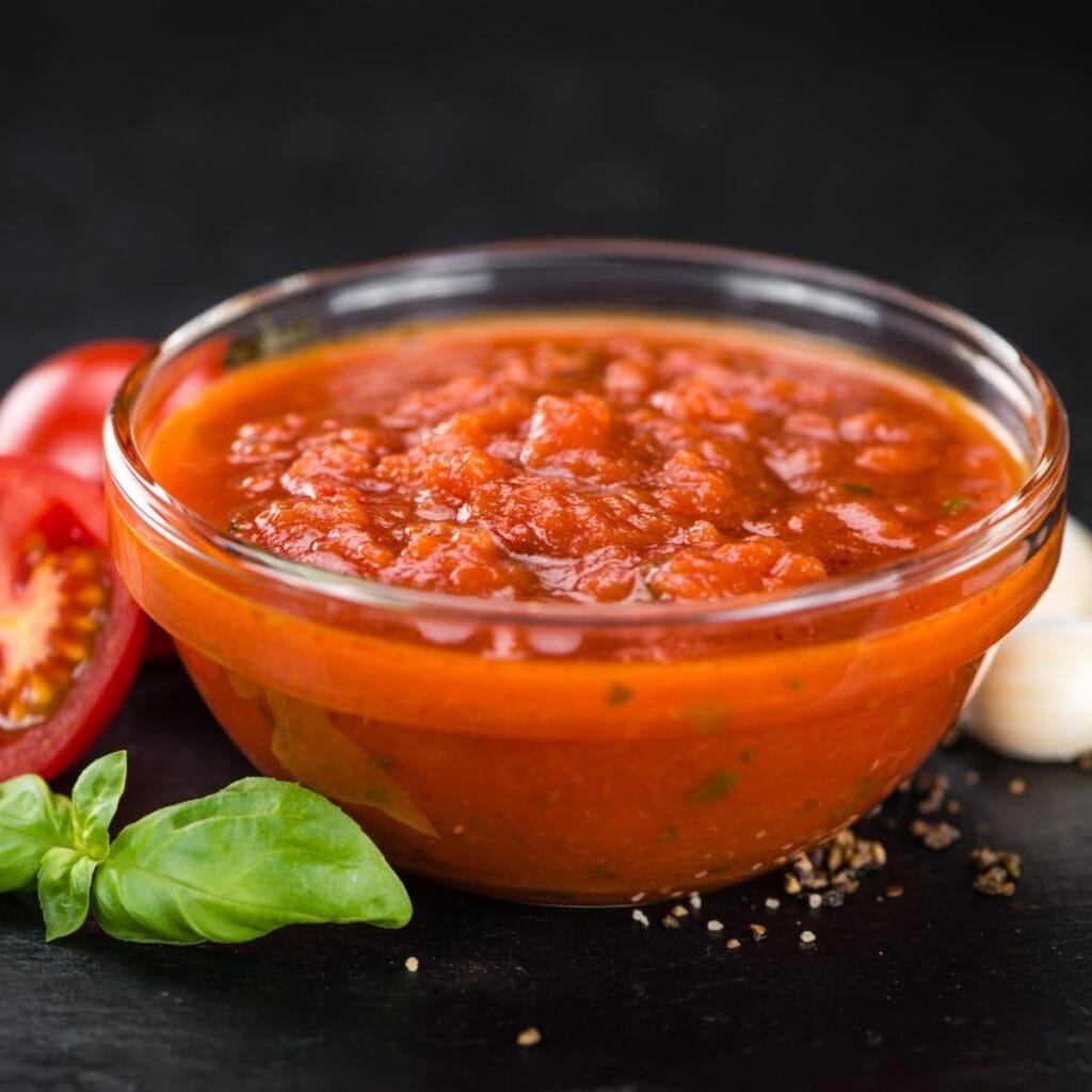 Spicy Tomato Sauce in a Small Clear Bowl
