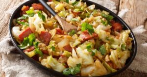 Homemade Sauteed Savoy Cabbage in a Black Plate