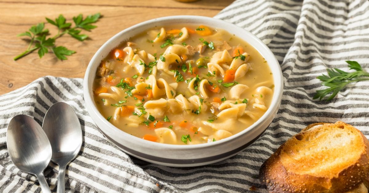 Warm Homemade Chicken Noodle Soup with Bread