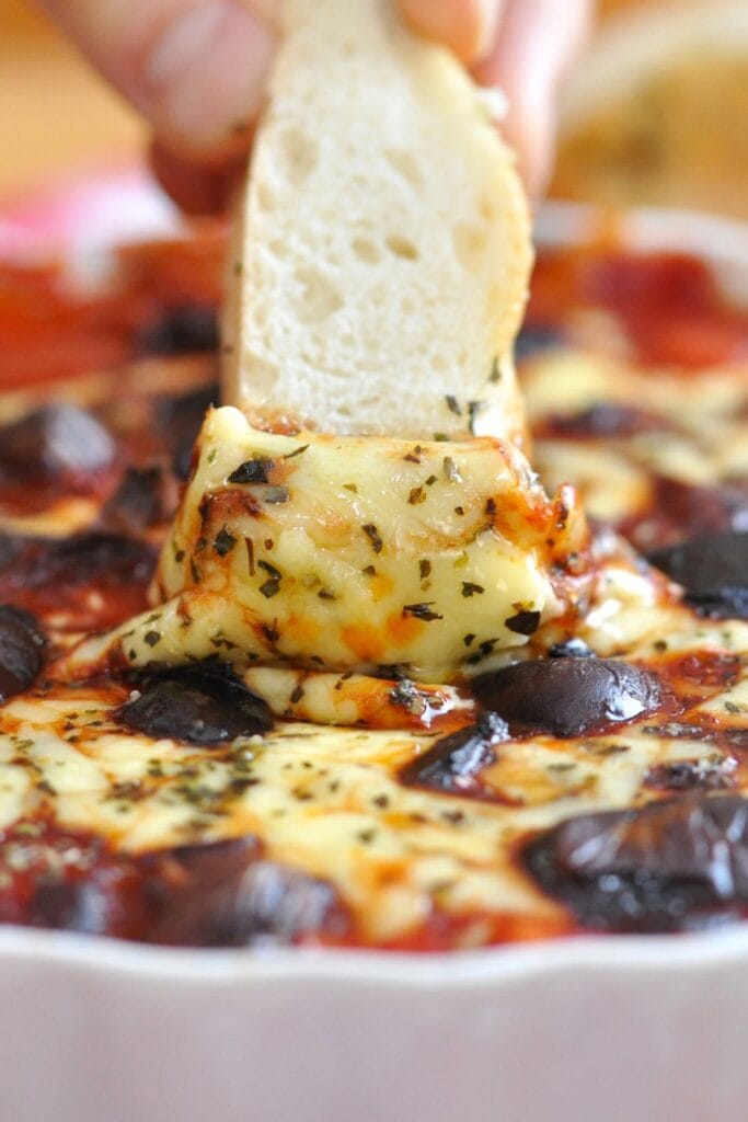 25 Easy Pizza Bowls For a Fun & Flavorful Dinner. Shown in picture: Homemade Pizza Dip with Bread in a Bowl
