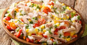 Homemade Rice Salad with Corn, Green Peas, Tuna and Tomatoes