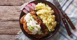 Homemade American Fried Steak with Mashed Potatoes and White Gravy