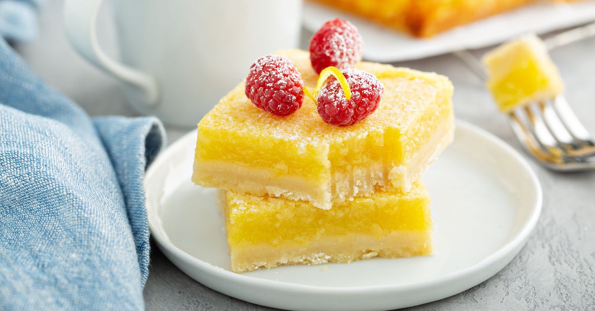 Homemade Lemon Bars Topped with Fresh Raspberries