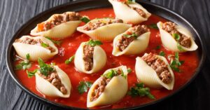 Homemade Stuffed Pasta Shells with Ground Beef, Marinara Sauce and Herbs