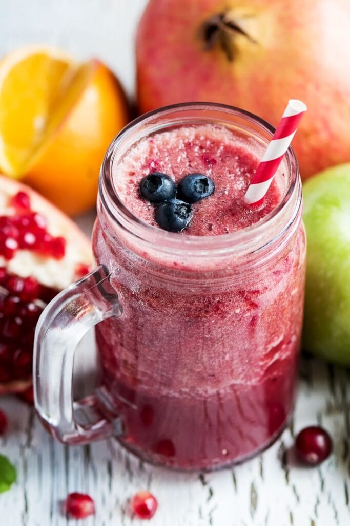 Refreshing Fruit Breakfast Smoothie with Pomegranate and Orange