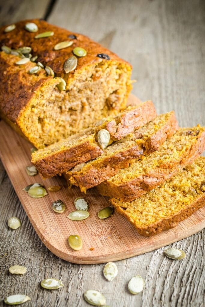 25 Fall Bread Recipes You'll Fall For: Soft and Fluffy Pumpkin Bread with Pumpkin Seeds