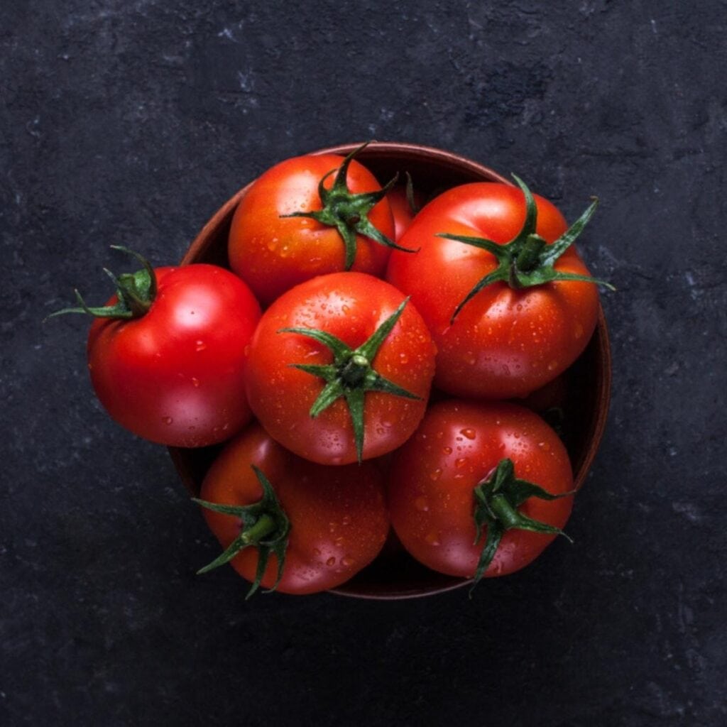 Fresh Red Tomatoes in a Brown Bowl