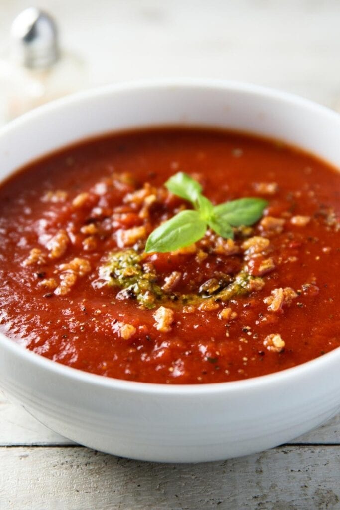 Bowl of Tomato Soup with Pesto Sauce