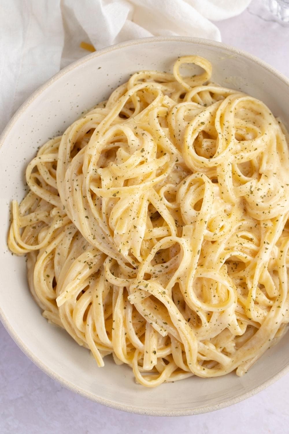 Creamy Fettucine Recipe in a Bowl with Butter, Cream and Cheese