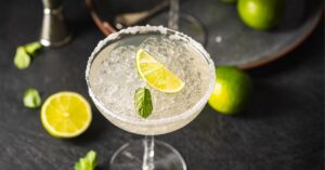 Homemade Boozy Margarita Cocktail with Lime, Ice and Salt