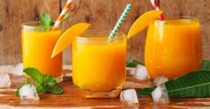 Refreshing Homemade Tropical Mango Smoothie with Fresh Fruits