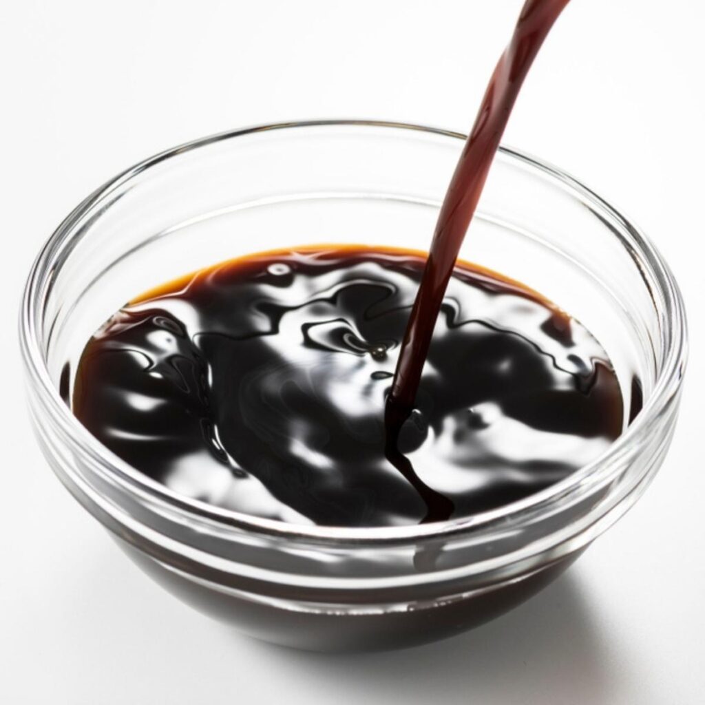 Worcestershire Sauce Poured in a Glass Dish