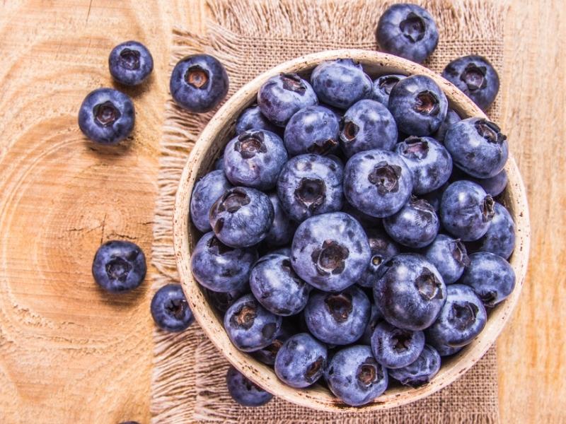 Huckleberries on a Wooden Bowl