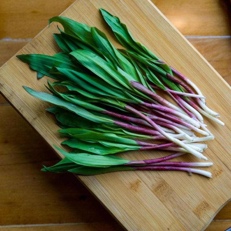 Fresh Ramps Laid on a Wooden Chopping Board