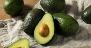 Raw Organic Green Avocados in Bunch