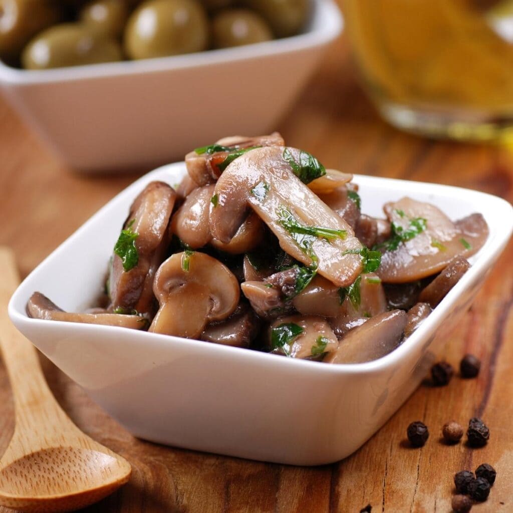 Sauteed Mushrooms in a White Bowl