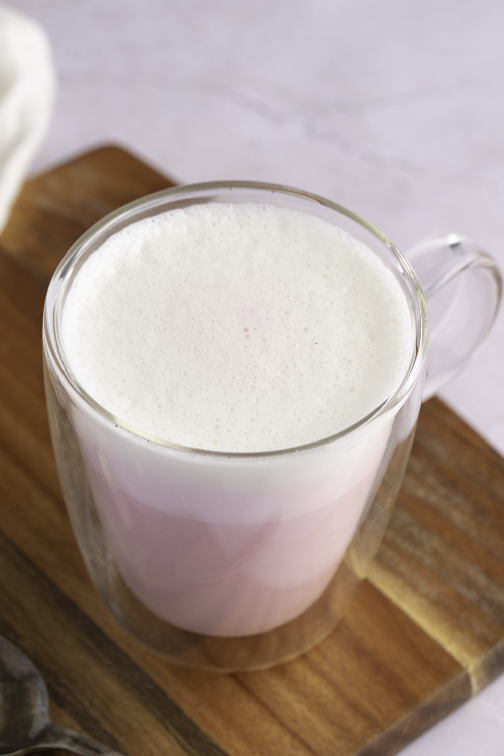 Foamy Angel Milk on a Clear Glass Mug