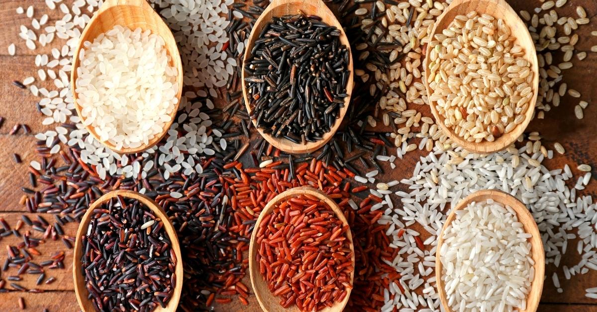 Different Types of Rice in a Wooden Spoon