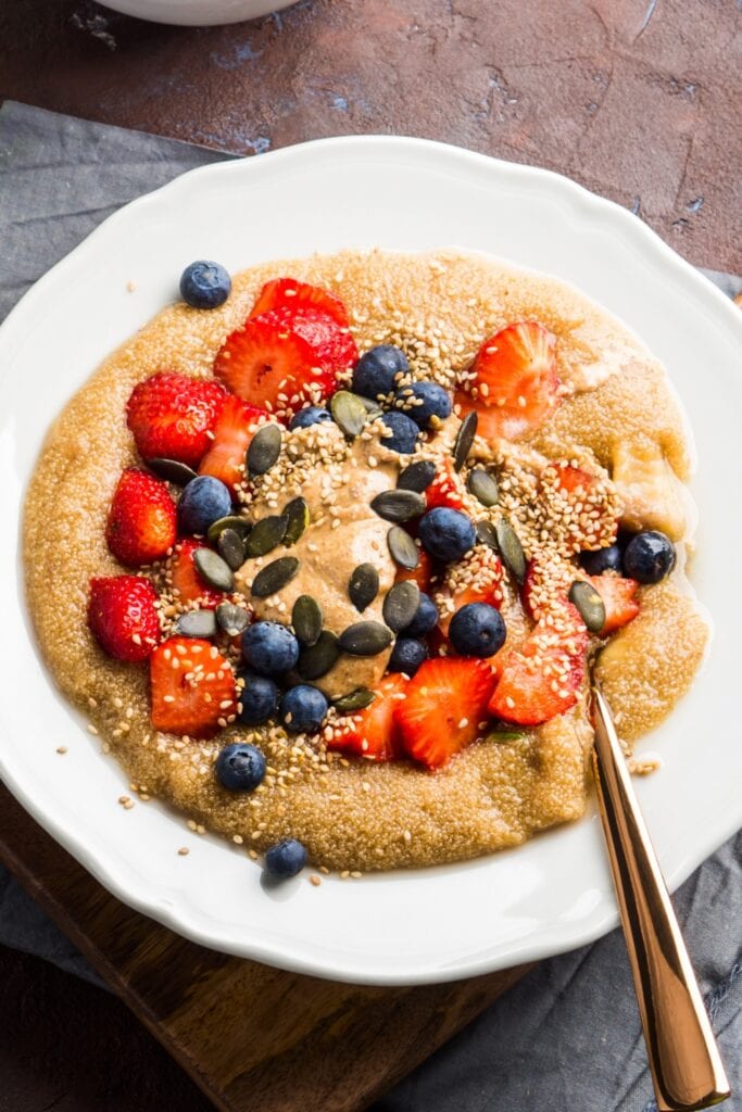 Healthy Amaranth Porridge with Fresh Berries and Pumpkin Seeds