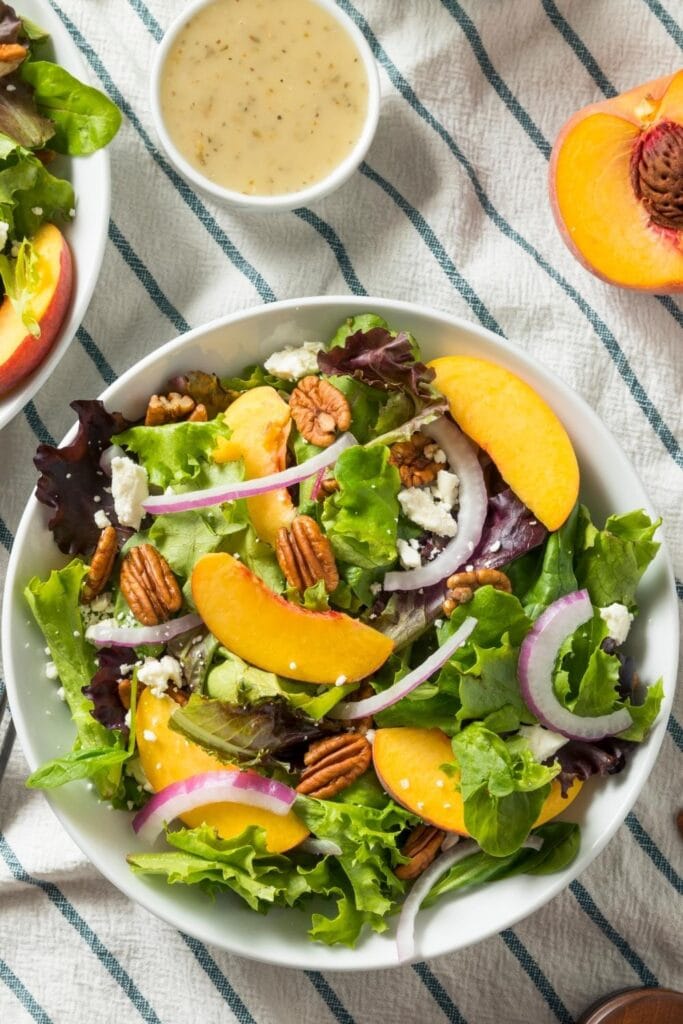 Healthy Homemade Peach Salad with Pecans, Cheese and Dressing