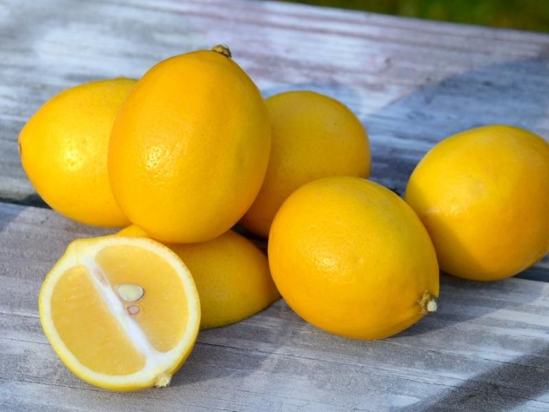 Meyer Lemons on a Wooden Table
