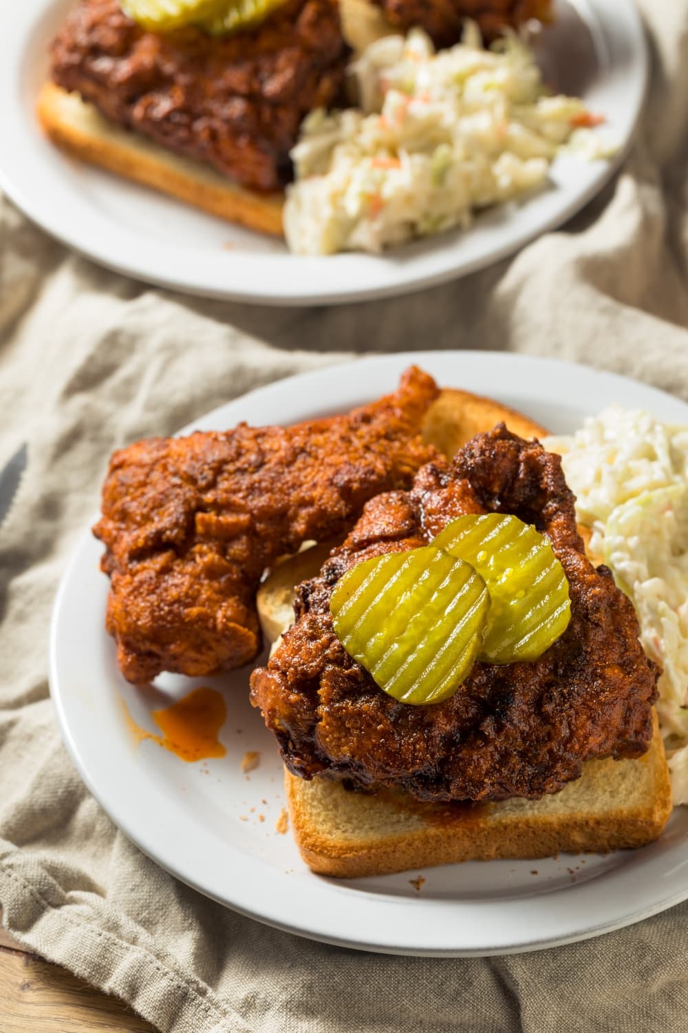 Nashville Hot Chicken Served with Pickles, Coleslaw and Bread