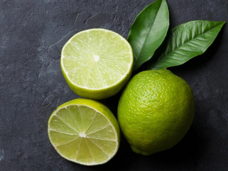 Whole and Sliced Fresh Perrine Lemons