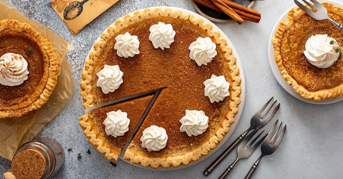 Savory Sweet Potato Pie with Whipped Cream and Cinnamon