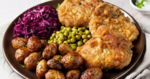 Traditional Icelandic Lunch Foods: Braised Pork, Peas, Red Cabbage and Baby Potatoes
