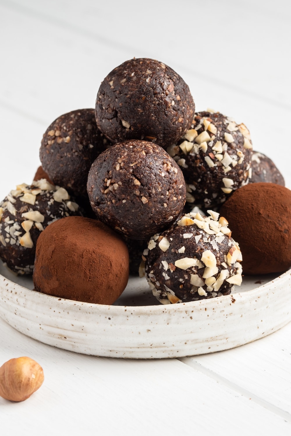 Assorted Coated Rum Balls on a saucer