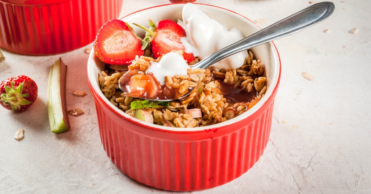 Homemade Rhubarb Crisp with Granola, Oatmeal and Strawberries in a Ramekin