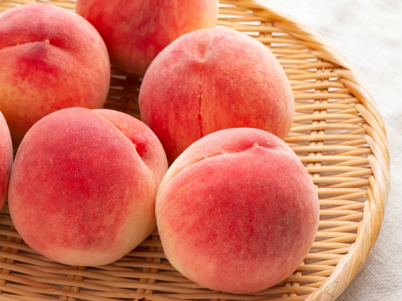 Fresh Peaches on Woven Tray