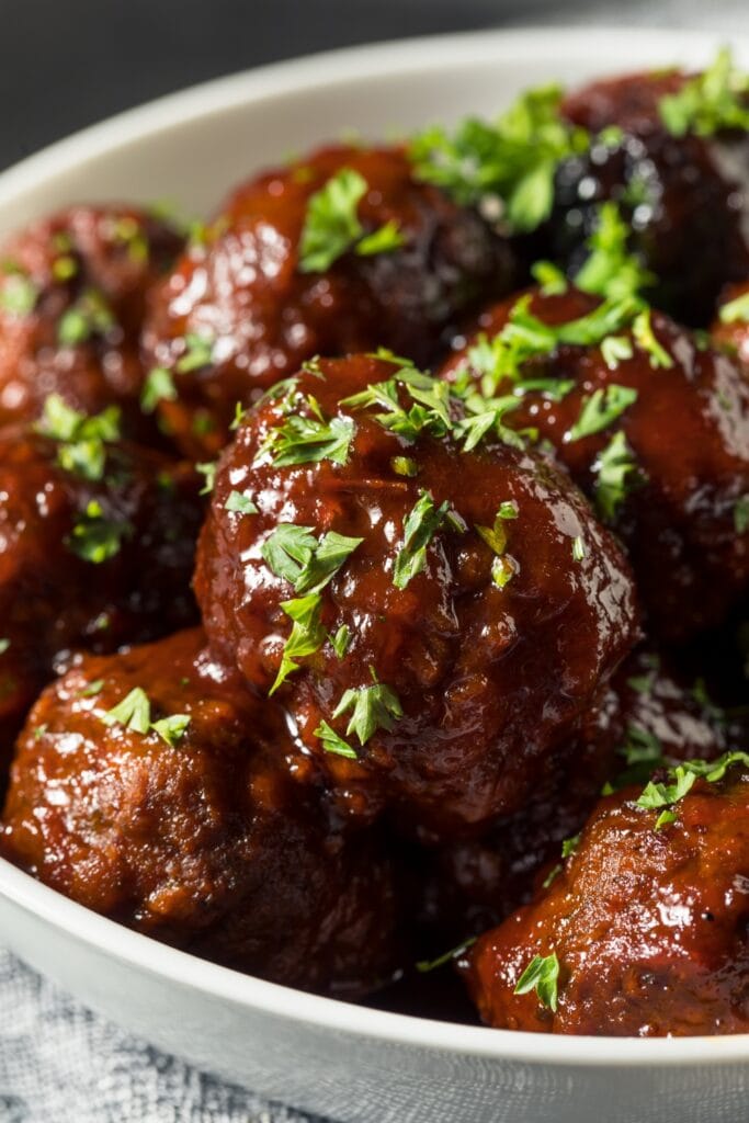 Barbecue Meatballs with Herbs in a Plate