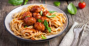 Homemade Italian Meatballs with Pasta, Basil and Tomato Sauce