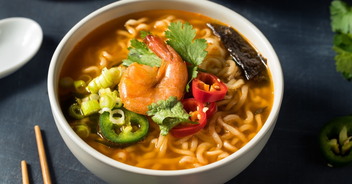 Bowl of Spicy Seafood Ramen with Shrimp and Peppers