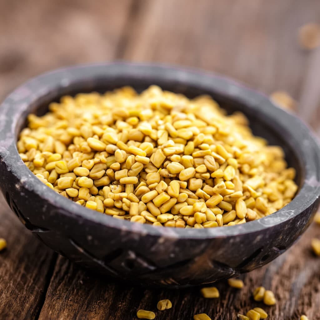 Fenugreek on a Wooden Spice Bowl