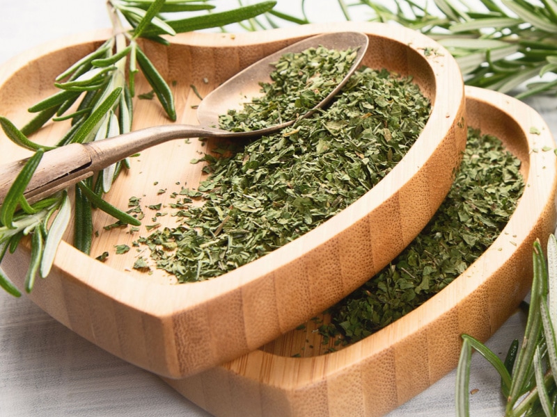 Dried Rosemary on a Heart Shape Wooden Bowl