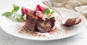 Sweet Homemade Molten Cake with Raspberries and Mint