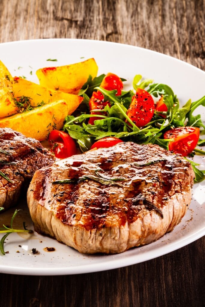 Grilled Pork Chops with Vegetable Salad and Potatoes