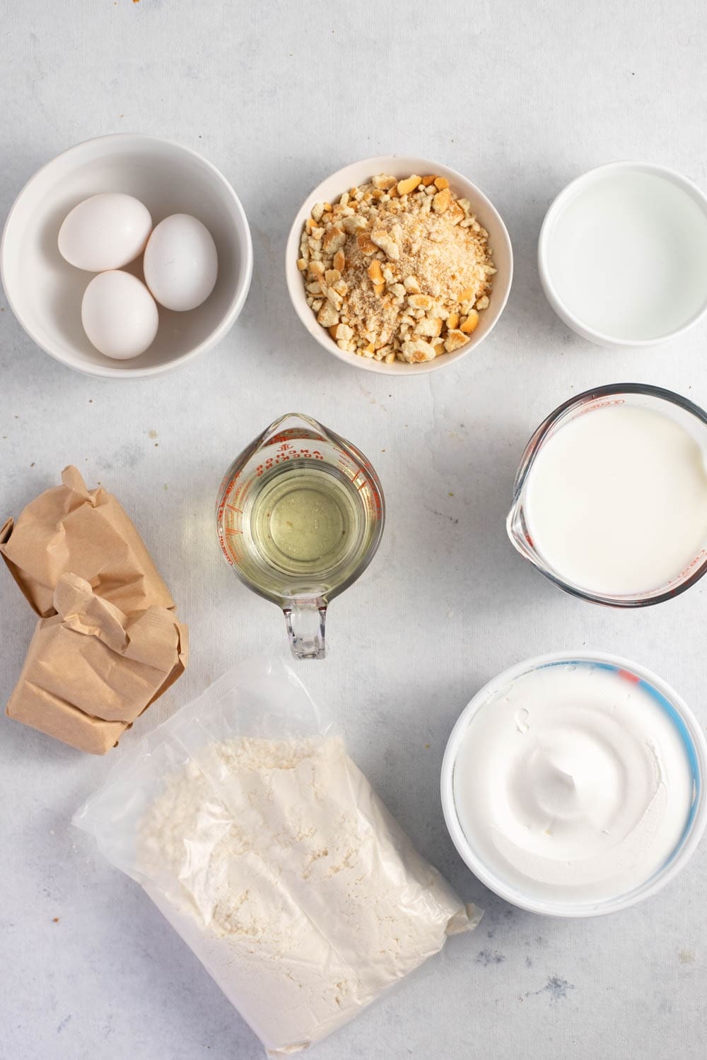 Banana Pudding Poke Cake Ingredients - Water, Vegetable Oil, Egg, Yellow Cake and Banana Pudding Mix, Whipped Topping and Vanilla Wafers