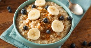 Bowl of Homemade Steel Cut Oatmeal with Fruits and Cinnamon